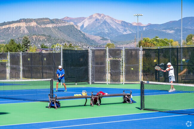 Tennis players enjoy a game on the courts found at Smith Sports Complex.