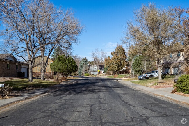 Enjoy clean streets and beautifully aged trees in Oak Crest South, Arvada, Colorado.
