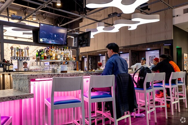 Enjoy a drink at the bar at Legal Seafood.