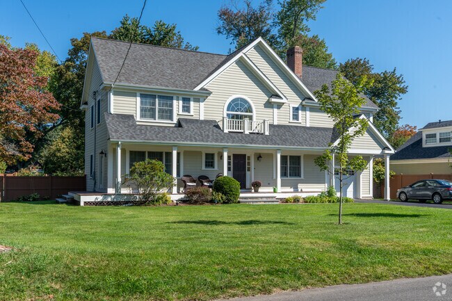 Charming two-story home in Cranbury showcasing a mix of traditional and modern elements.