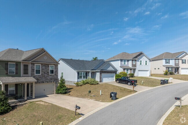 Many homes built in the 1990s in White Knoll feature Minimal Traditional styles with simple, functional designs.