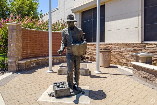 A statue dedicated to farm workers stands in Hughson.