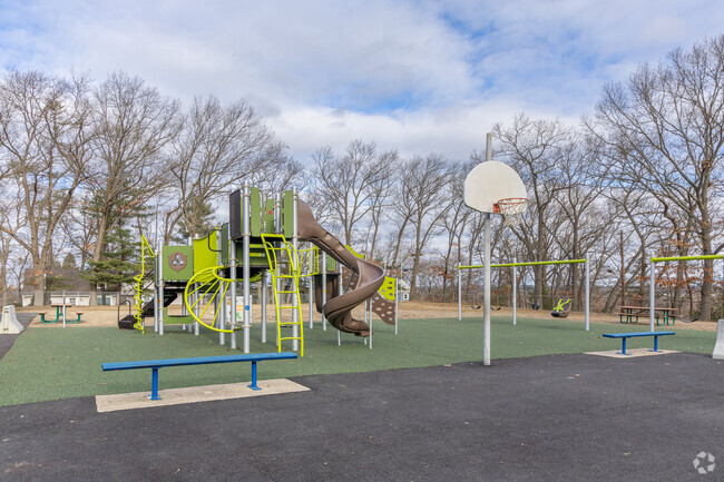 The playground and basketball court areas of the Walton School in Wakefield, MA.