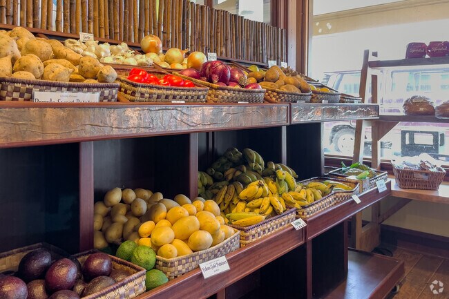 Pick up some fresh produce at a roadside supermarket.