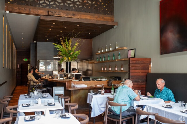 Forestland residents gather at Kakui for freshly made sushi.