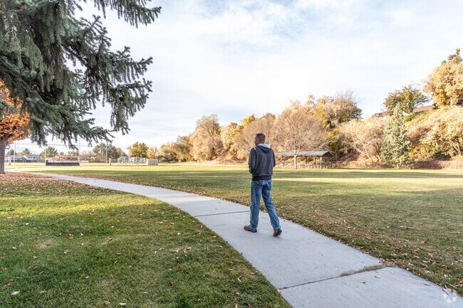 Enjoy a walk at Lions Park located in the Rivergrove neighborhood.