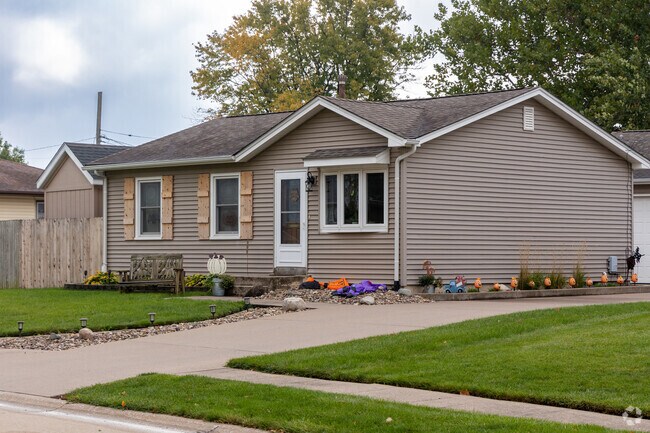 The curb appeal of this Ginger Hill Ranch style home is off the charts.
