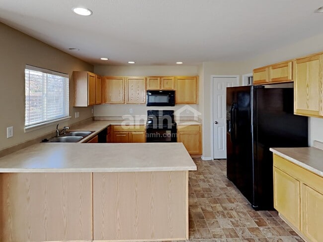 3910 S Quatar St, Aurora, CO 80018 - photo 3