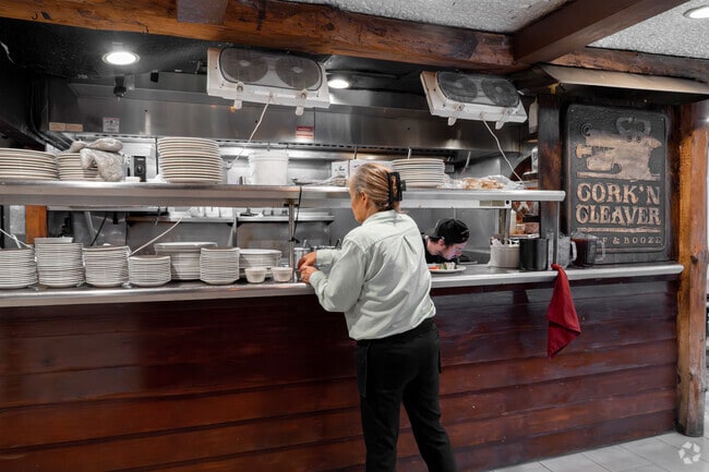 Cork' n Cleaver serves prime rib in a steakhouse with a romantic atmosphere.