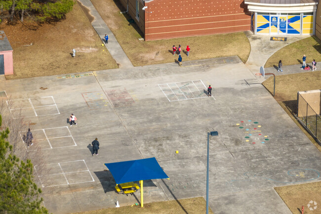 Hillside Elementary School features play spaces on blacktop for kids to enjoy.
