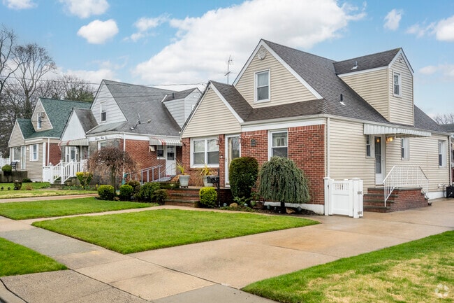 Cape Cod style homes are often situated on small acreage lots.