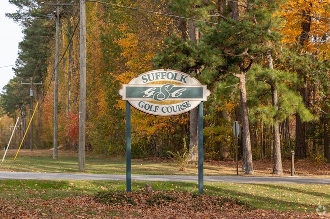 The Suffolk Golf Course in Holy Neck offers scenic views amongst the trees.