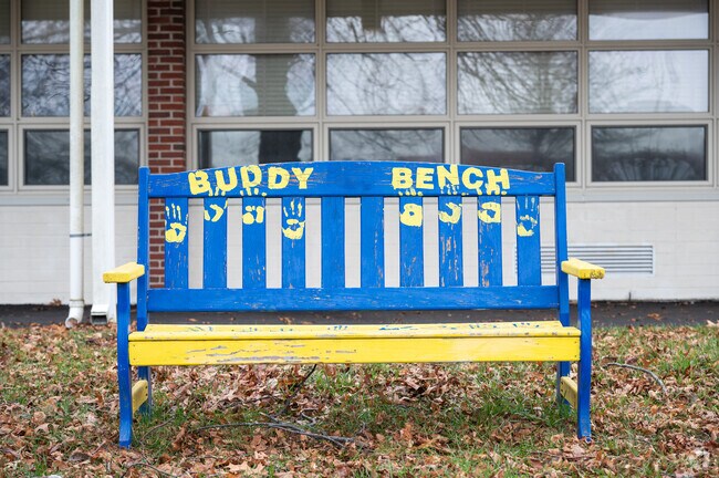 Rest on the bench outside of Cedar Elementary School in Hanover.