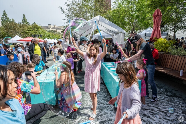 Kids enjoy making bubbles at the Beckman Arts & Science Family Festival.