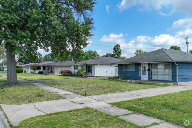 Rows of bungalows with mature trees are scattered throughout Swanson Park.