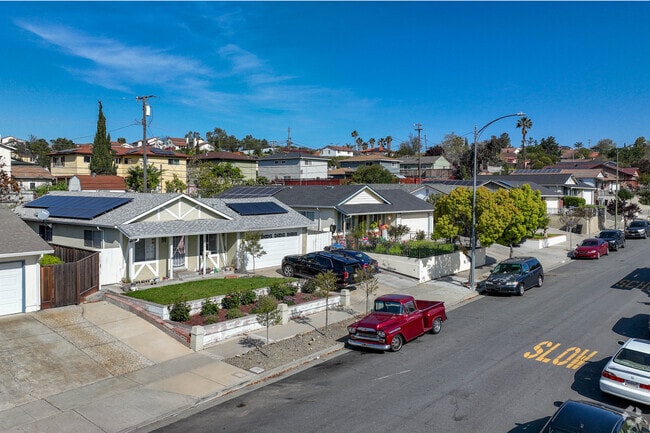Clean street and green lawns in Edenvale neighborhood.