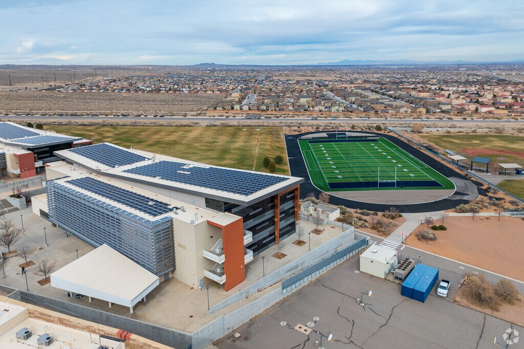 Atrisco Heritage Academy High School's rooftop solar array and football field.