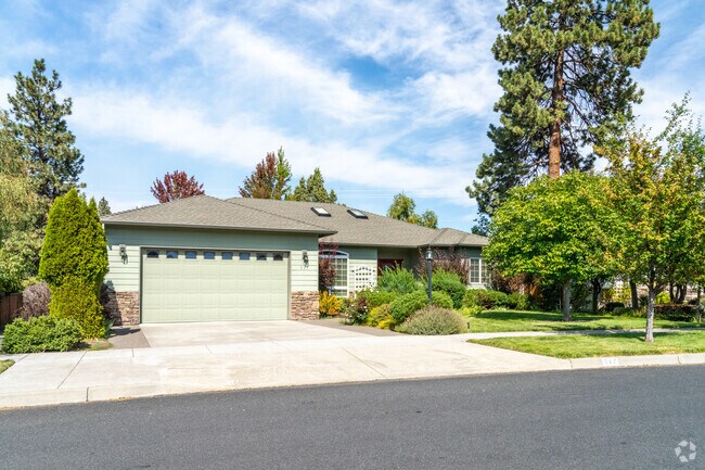 Beautiful Larkspur home with a sunlit garden and inviting front porch—where comfort meets charm.