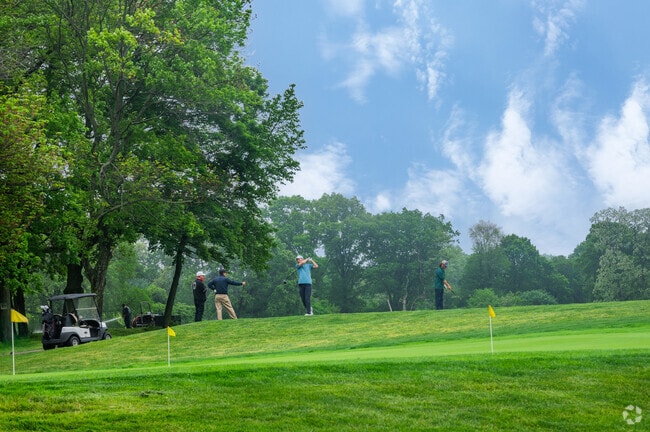 Clearview Park Golf Course's 18 holes offer a lush, tree-lined escape perfect for a peaceful day of play in the heart of Queens.
