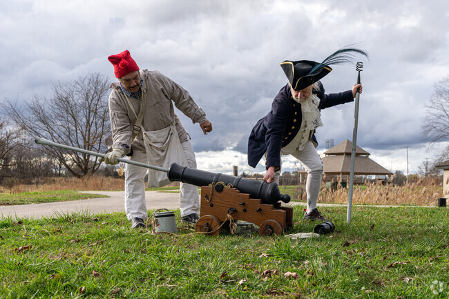 Reenactors ready a cannon at the Living History Encounter event in Big Run.