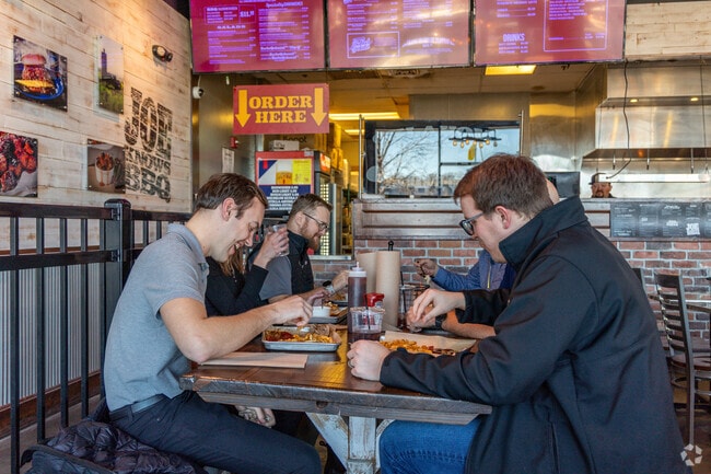 Enjoy succulent ribs and flavor packed sides at Oklahoma Joe’s BBQ.