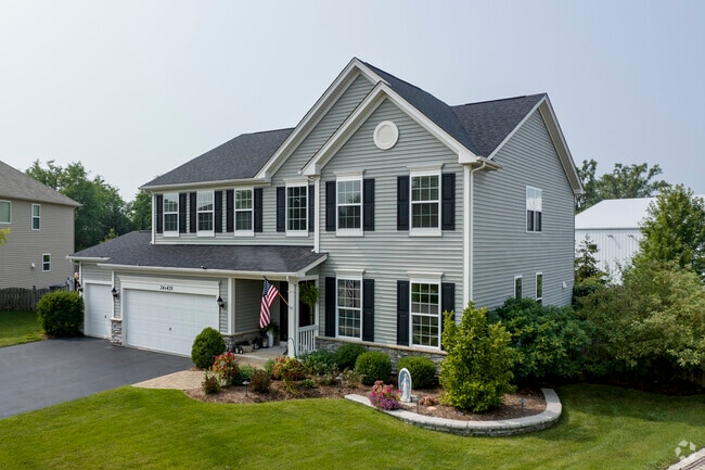 Manicured lawns and three-car garages come standard in Valley View's newer subdivisions.