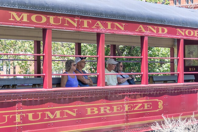 Penn Forest residents enjoying the scenic view from the train that tours the Pocono Mountains.