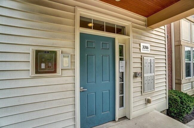 Entrance into the condo building with each units' mailbox