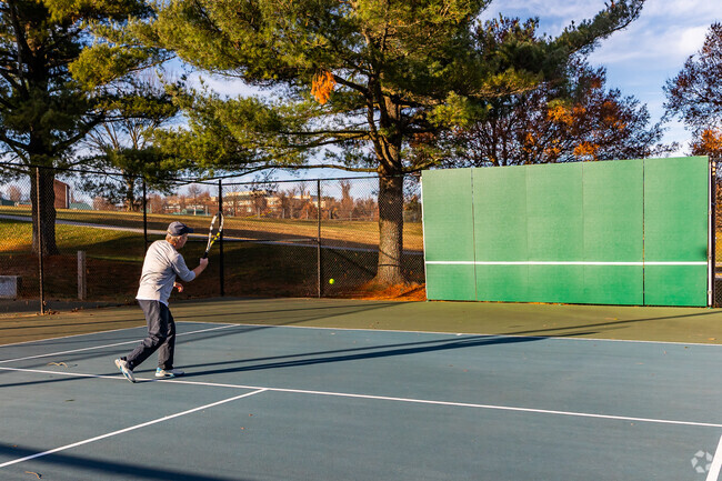 Watkins Park boasts many sports facilities included a tennis court.