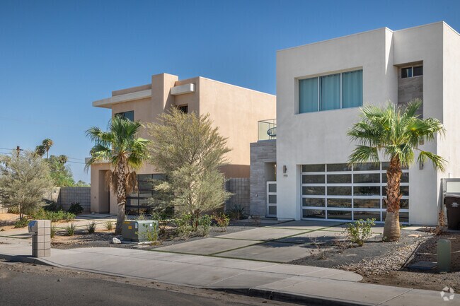 A new development of modern single-family homes seen in Racquet Club West.