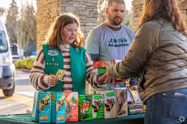 Girl Scouts sell cookies outside Safeway near Snohomish Cascade during cookie season.