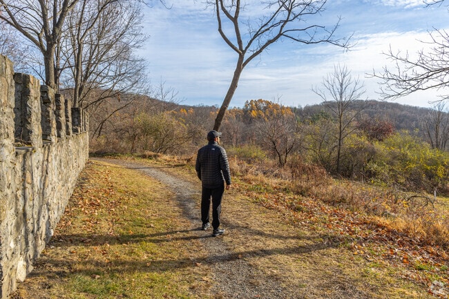 Explore the Bear Mountain Reservation for scenic hiking trails in Danbury.