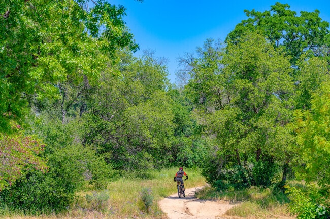 Folsom Lake near Olympus Pointe is well known for its mountain bike trails.