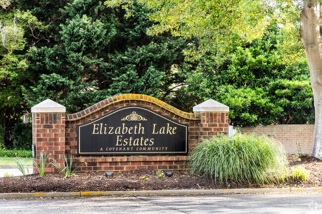 Elizabeth Lake Estates offers waterfront living, a community pool, and quiet streets near downtown Hampton.