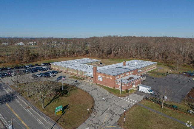 Abundant arboreal backdrop surrounds students at South Elementary School in Somerset.