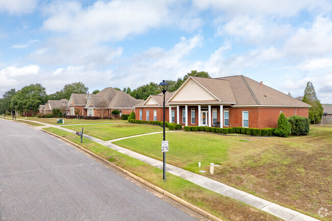 D'Iberville neighborhoods have many brick homes lining quiet streets.