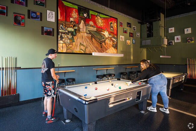 Come to The Vault in Centennial with friends to grab a drink and shoot a game of pool.