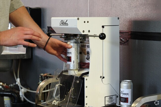 Take home some fresh Scotch Ale from the Ghost Runners Brewery in the Walnut Grove neighborhood.