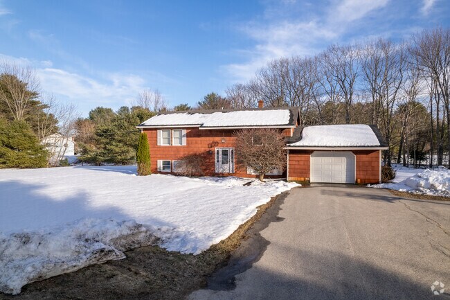 This two-story brick home in Buxton is spacious and has a large front yard.