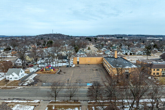 Immaculate Conception Elementary School has a large recess area and playground.