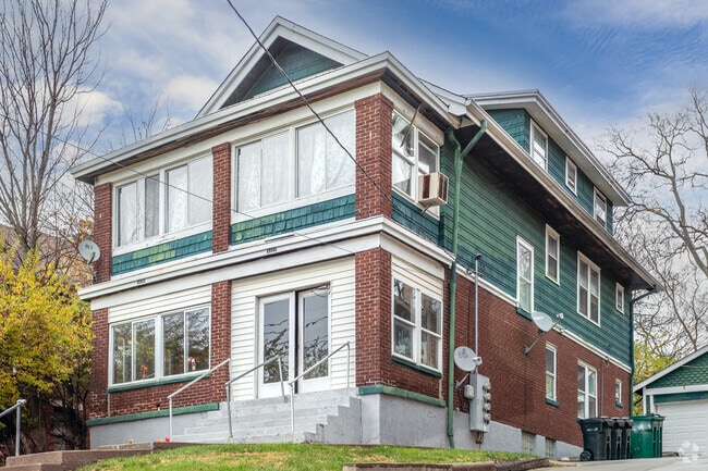 The exterior of this Avondale house is a combination of brick and wood framing.