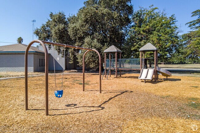 Kids enjoy the playground at Gianone Park in Stockton.