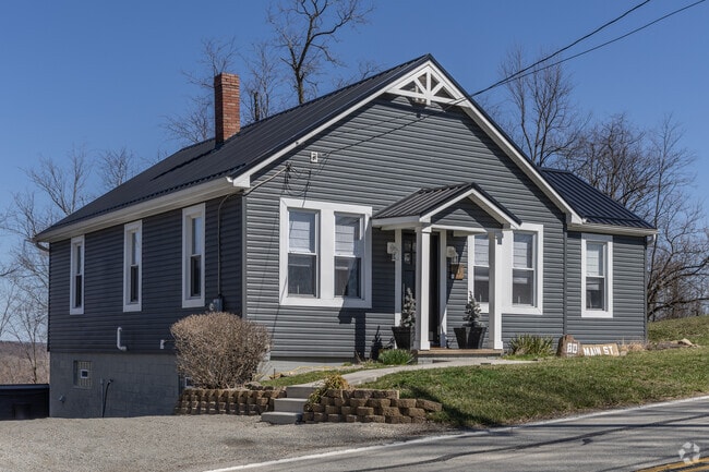 Small ranches sit close to the road with large back lots in Hopewell Township.
