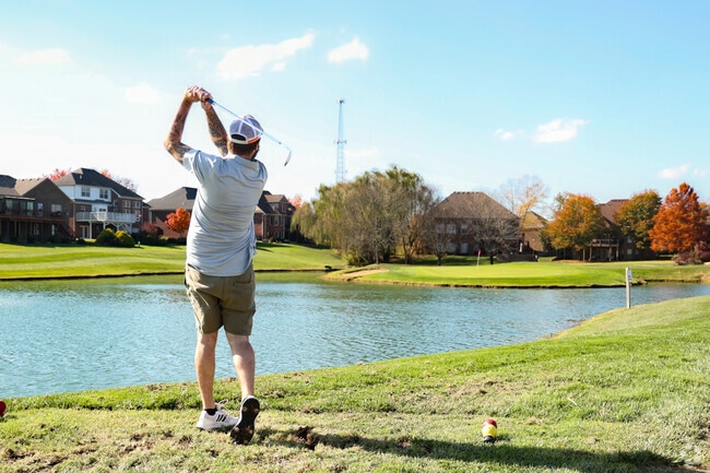 Golfers take advantage of a warm day at Cherry Blossom Golf Club in Southeast Scott County.