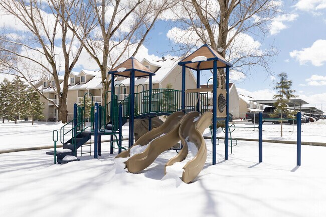 Marriott Park in Marriott-Slaterville features a playground with multiple slides.