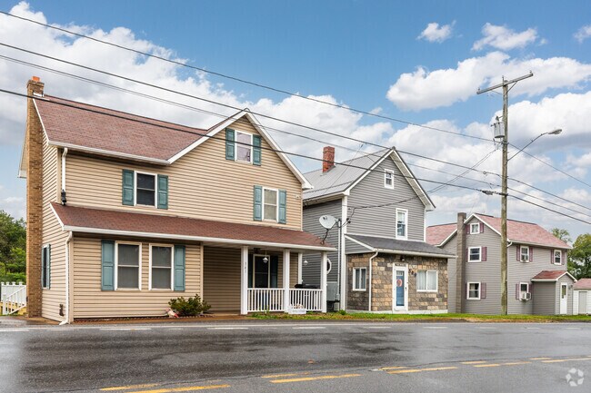 Various styles of houses stand side by side in East Carroll.