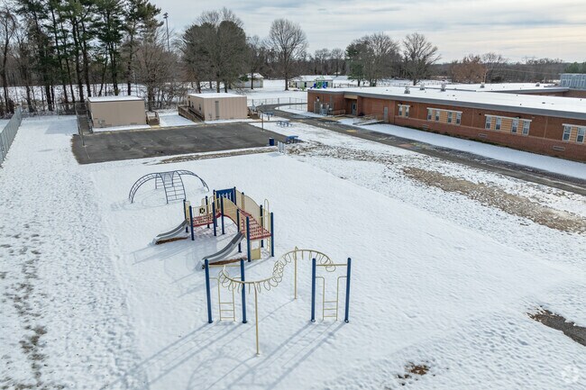 Students can use the playground, court, or open field at Tracey's Elementary School.