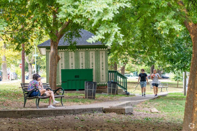 Winding walking trails include benches for relaxing at Clark Park.
