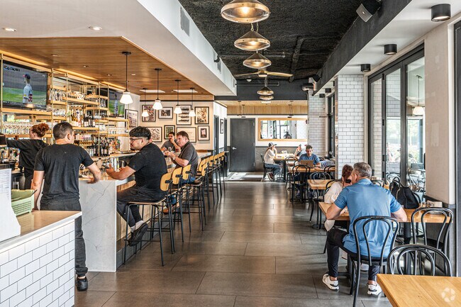 The Pizzeria of Bay Shore has a bar and outdoor dinning in Down Town Bay Shore.