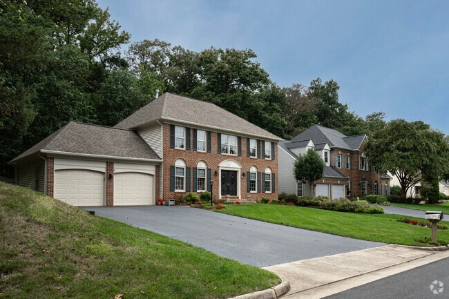 Brick homes line residential streets in Crosspointe.